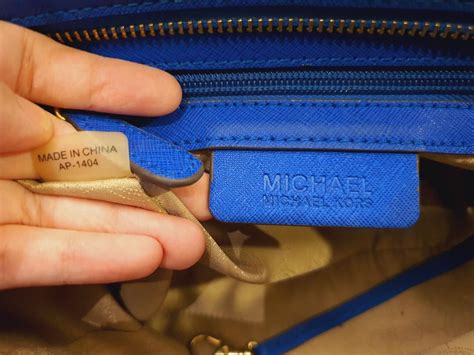 fake vs real michael kors bag|Michael Kors serial number checker.